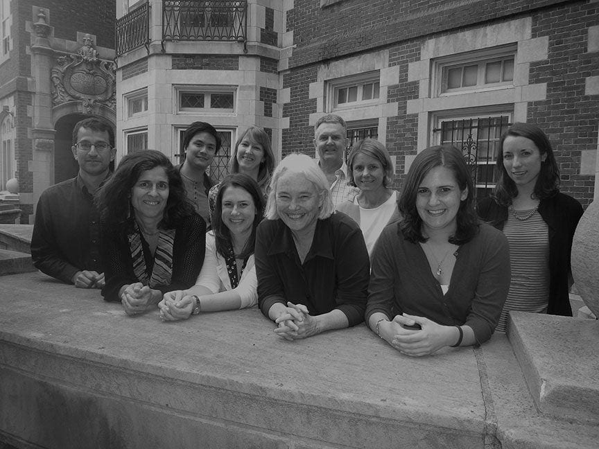 Mary Waters outside with group of researchers