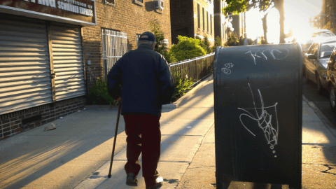Person walking with a cane