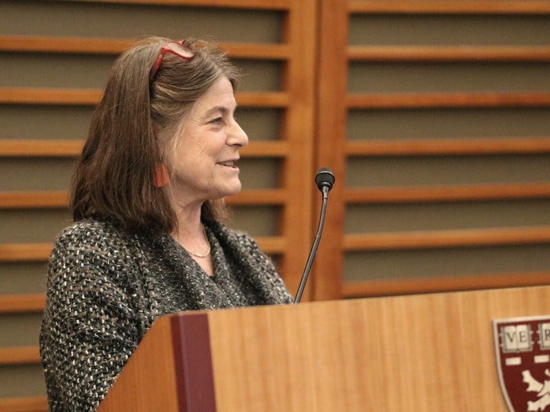 Lisa Berkman welcomes the audience
