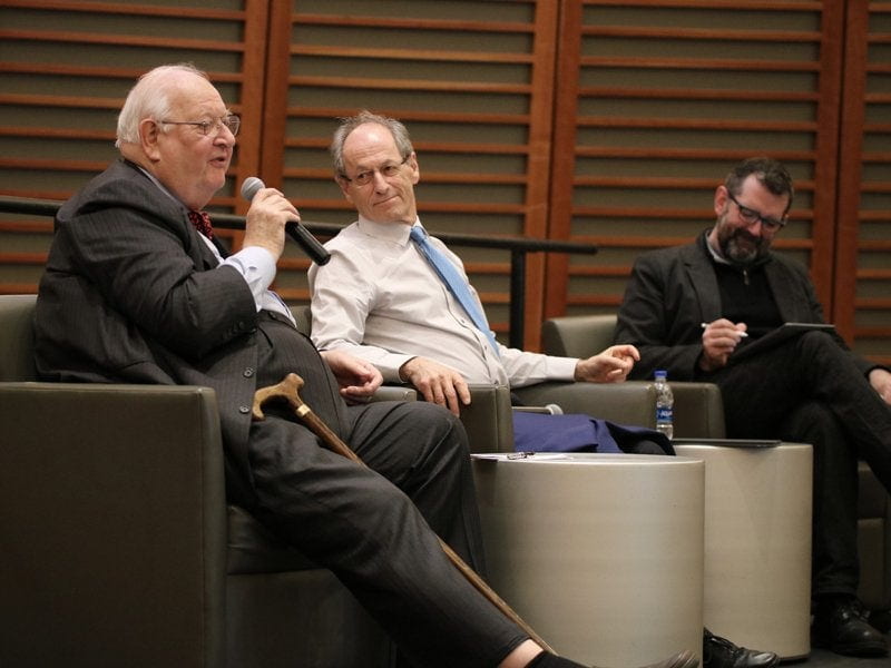 Jason Beckfield facilitates a discussion between the featured speakers
