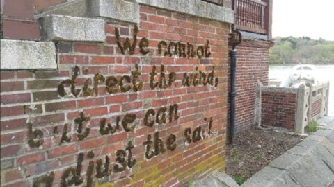 Brick wall with graffiti
