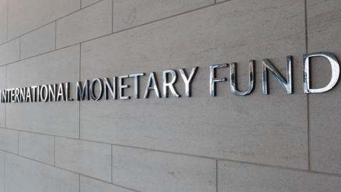 Photo of International Monetary Fund lettering on side of building