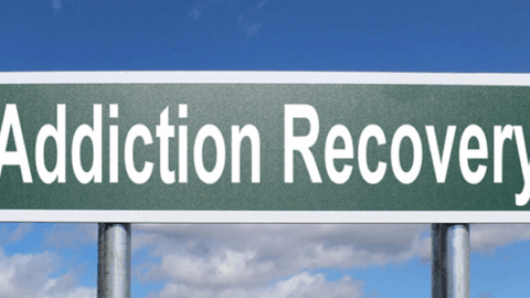 Sign that says "Addiction Recovery"