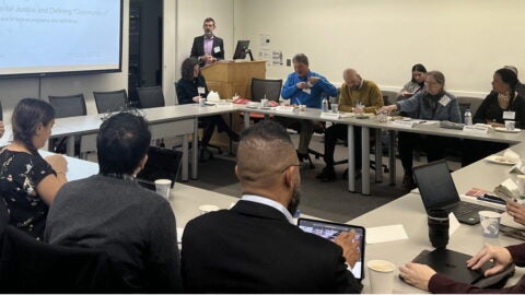 Jason Beckfield at podium at community and climate resilience exploratory workshop