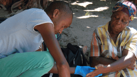 Older South African woman having blood taken for labs