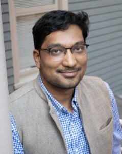 Head shot of Gupta