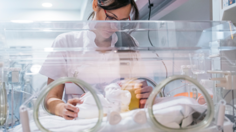 Woman with a baby in an incubator